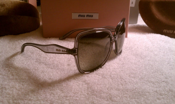 Miu Miu VMU 01MS